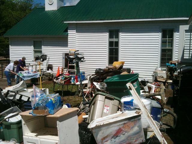 First order of business was getting everything outside, then determining what was trash and what could be salvaged.  We learned quickly that having items stored in plastic was not always a guarantee they'd remained safe when flood waters rose.