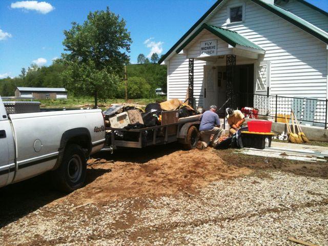 Several men brought their trailers and numerous trips were made as load after load of debris was hauled away.