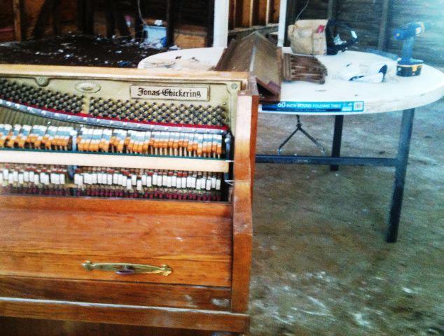 This piano was donated by one of the families in the church years ago.  Brother James, who does woodturning as a hobby, was able to salvage some wood from the top (see on the table behind it).  He can use this to make keepsakes for that family.